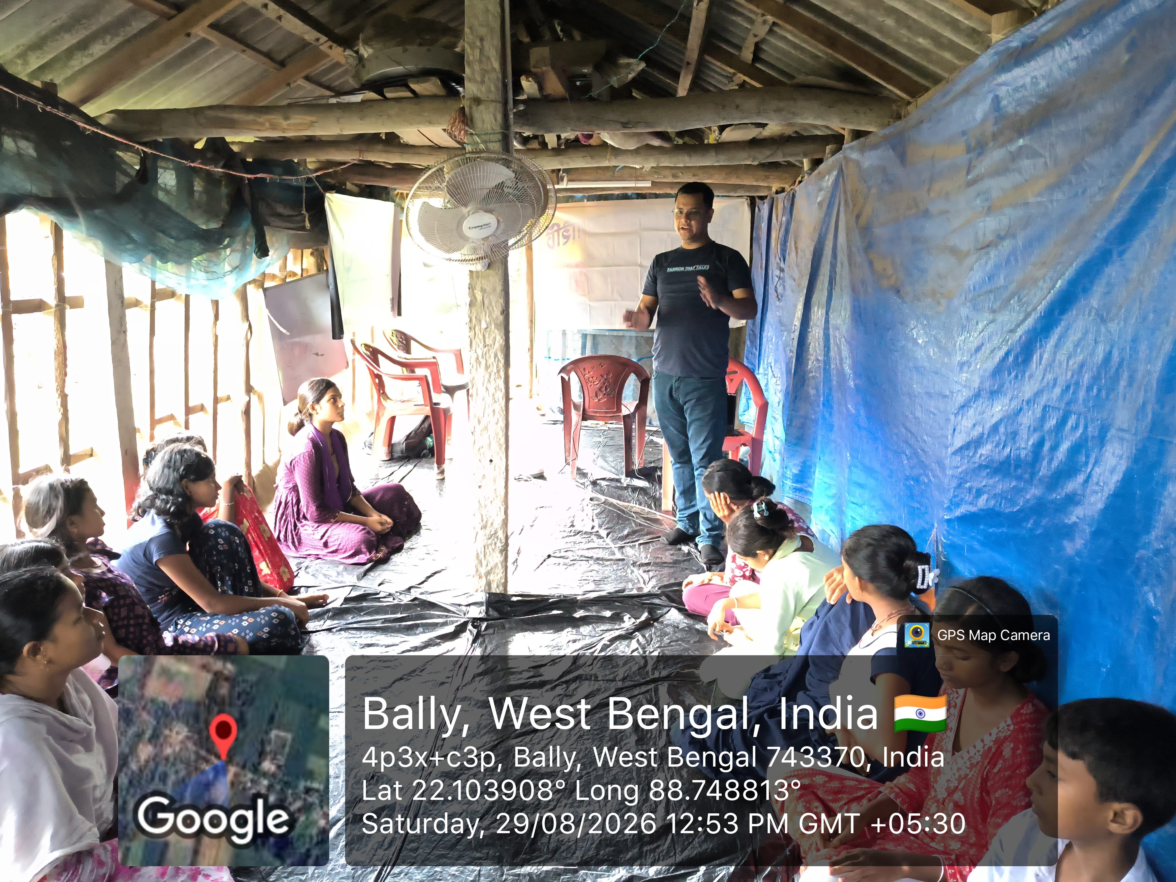 MAVI Foundation presenter explaining how a fake bank call works to students at a village pathsala in Gosaba Block, Sundarbans, 2026 (photo 3 of 8)