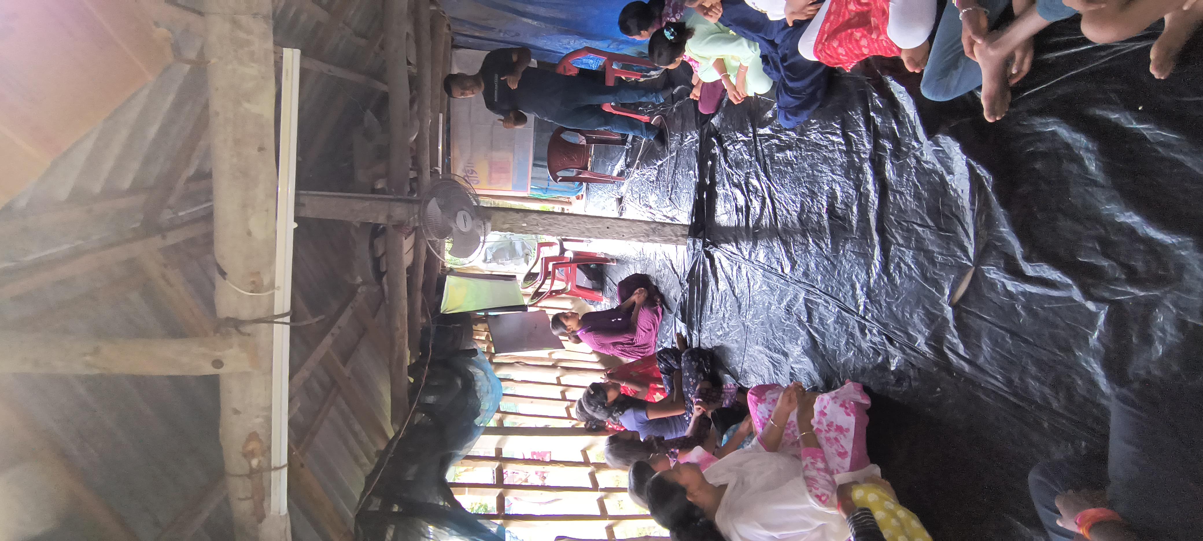 MAVI Foundation presenter explaining cyber fraud face to face, without slides, at the rural pathsala in Gosaba Block, Sundarbans, 2026 (photo 6 of 8)